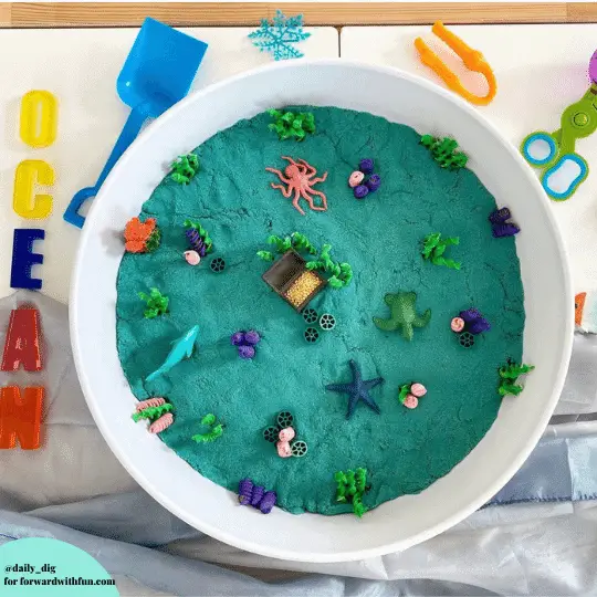 ocean themed kinetic sand sensory bin 